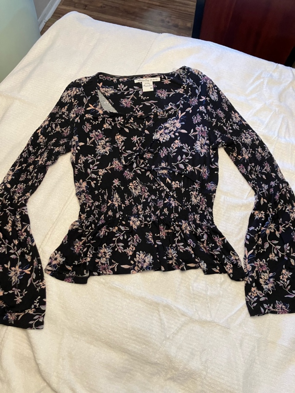 American Rag Black Floral Smocked Peplum Long Sleeve Top